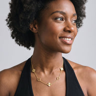 Model wearing the Clover Pendant Necklace in 14K gold-plated 925 sterling silver
