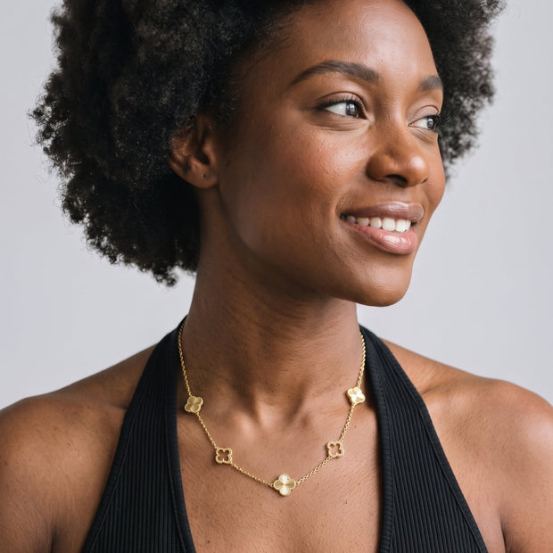 Model wearing the Clover Pendant Necklace in 14K gold-plated 925 sterling silver