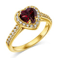 Hand wearing the 14K gold-plated red heart ring, showing the warm band and red AAAAA cubic zirconia heart.