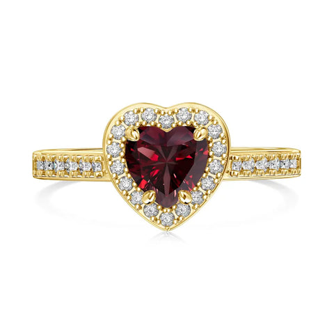 Macro detail of the gold heart ring revealing the deep red AAAAA ruby zirconia and polished setting. Hallmarked Loretana piece, hand-finished in Kaunas.
