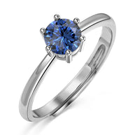 Close-up of a woman's hand wearing the personalized blue zirconia 925 silver ring from the Diamond Series