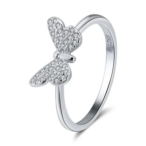 Close detail of the silver butterfly filigree ring showing pierced openwork wings, AAAAA cubic zirconia along the edges, rhodium plating over 925 sterling silver. Hallmarked Loretana piece, hand-finished in Kaunas.