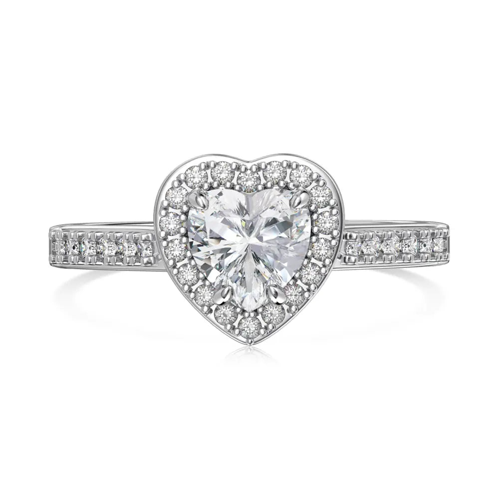 Close-up of the silver heart ring highlighting the high-refractive white zirconia and polished finish.